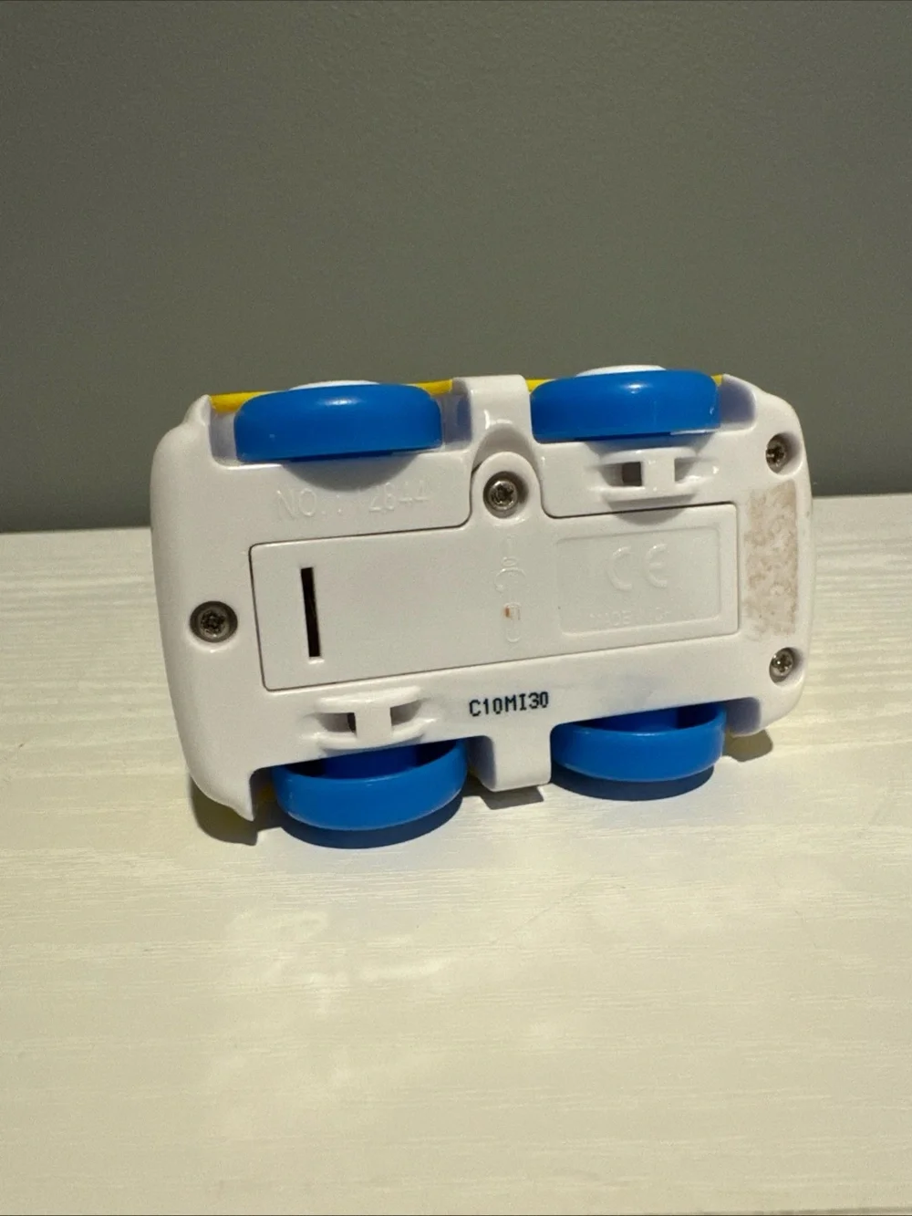 Yellow & Teal Kids Dump Truck Toy - Cute Face Design. Lights up and makes sounds